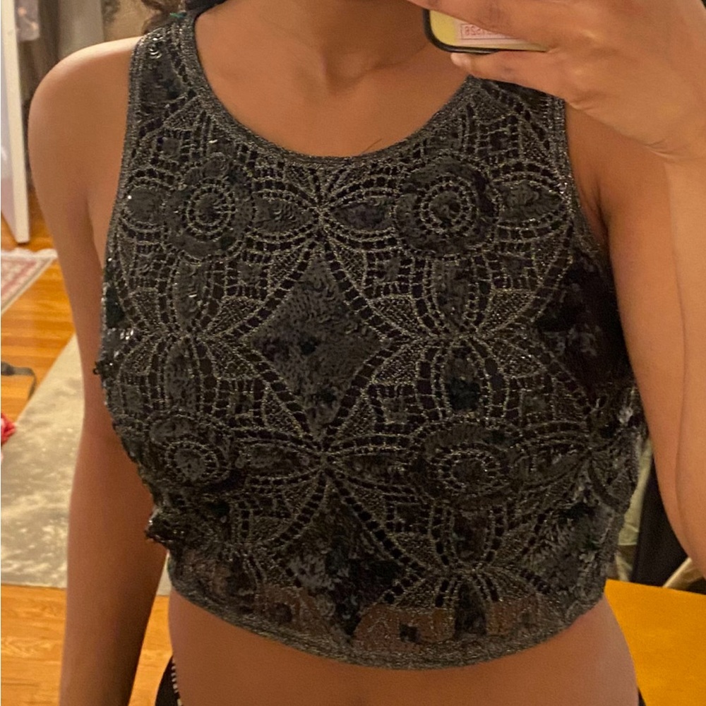 Black and silver sequined top
